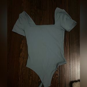 Aritzia xs body suit blue color